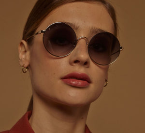 Lunettes de Soleil Femme Authentique GIGI BARCELONA modèle BALI  en métal Titanium Doré