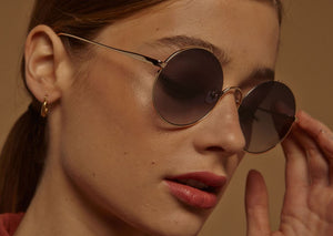 Lunettes de Soleil Femme Authentique GIGI BARCELONA modèle BALI  en métal Titanium Doré